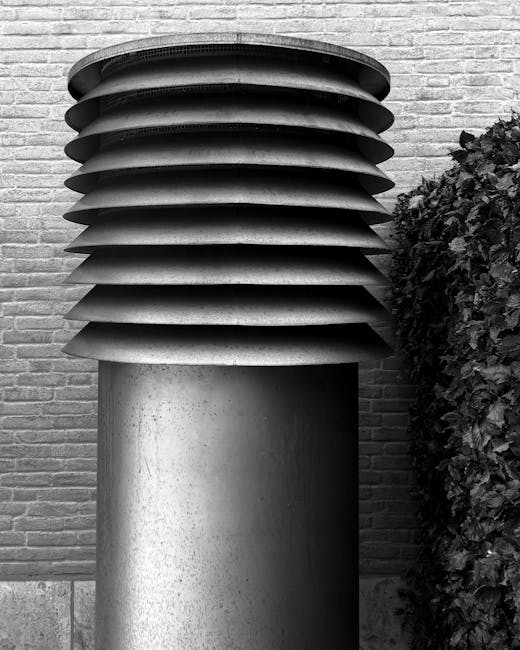 Virtuvės ar vonios ventiliacijos grotelės su oro srauto ženklomis fone